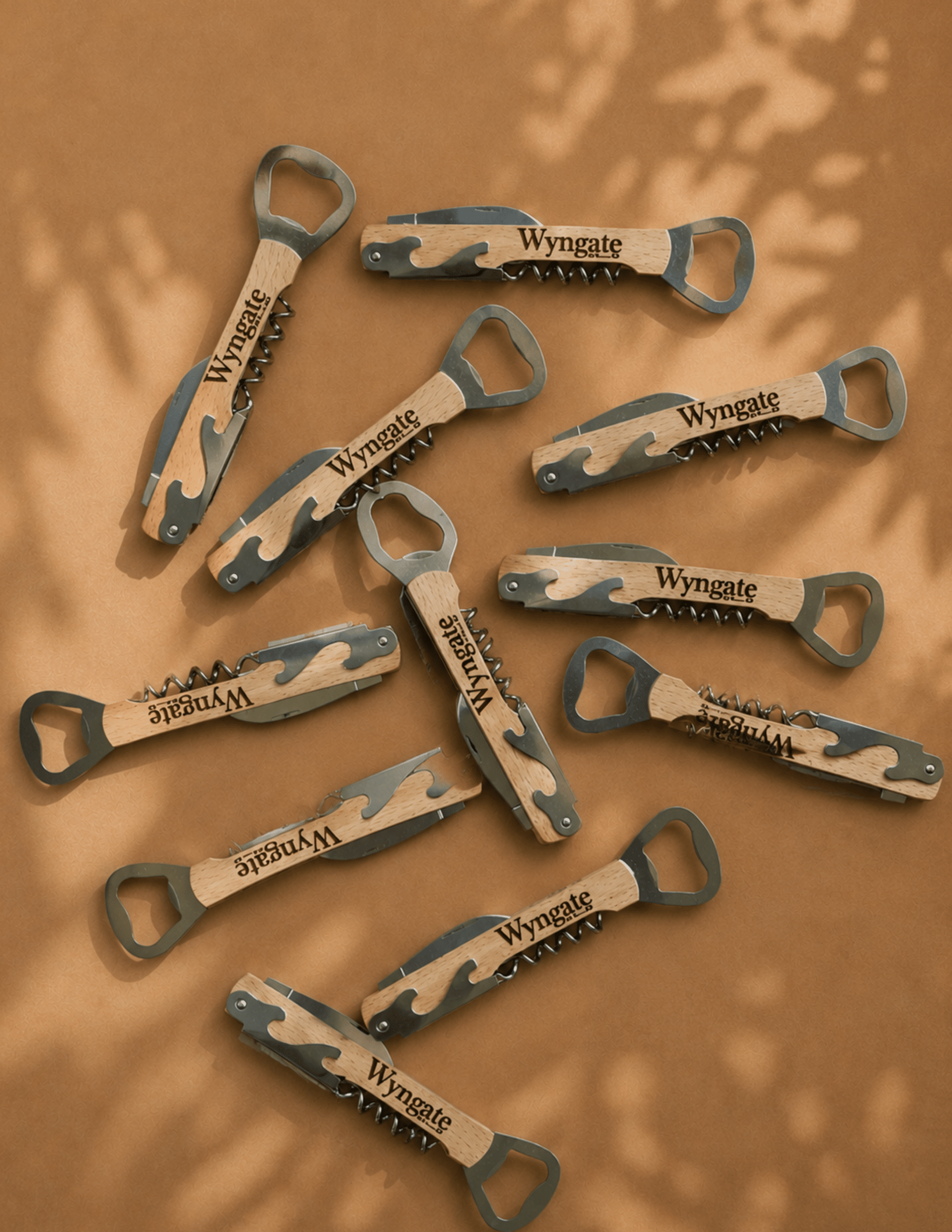Personalized wine bottle opener with engraved wooden handle, corkscrew, and built-in bottle opener.