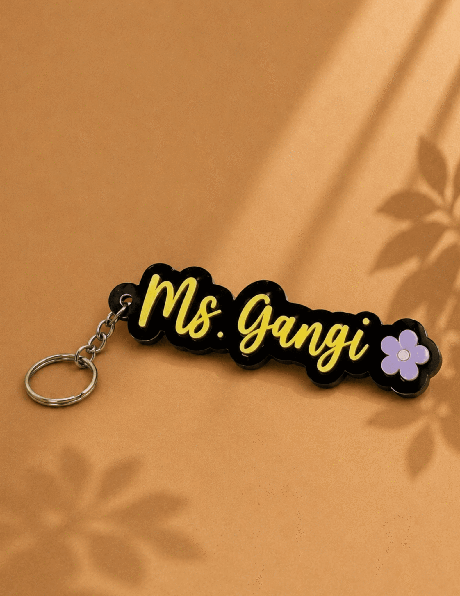 Personalized 3D acrylic teacher keychain with custom name lettering and flower accent.
