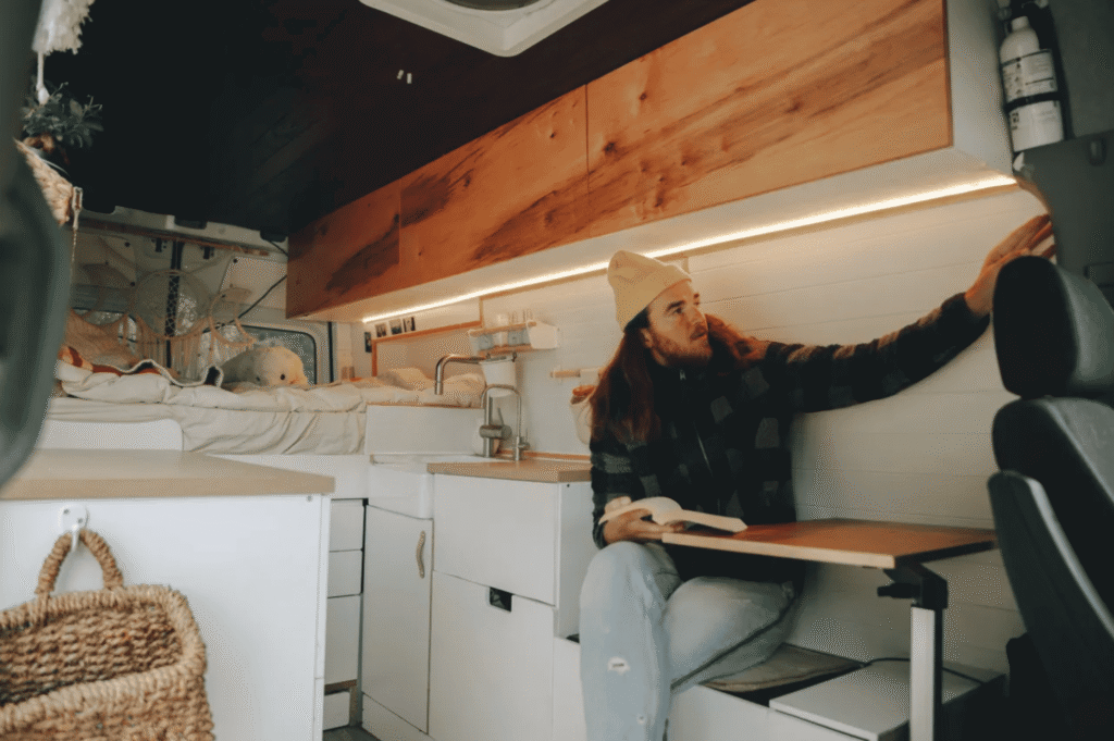 Cozy camper interior with modern decor and wood accents